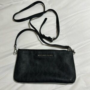Michael Kors Crossbody, practically new!  Silver trim with silver zipper